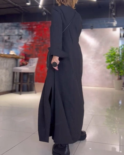 Loose, long dress with side slits