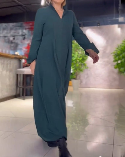 Loose, long dress with side slits