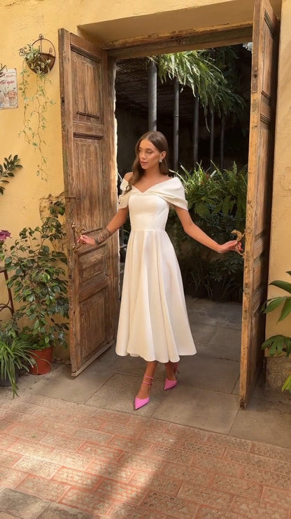 Deliha — Flowy Off-Shoulder Dress