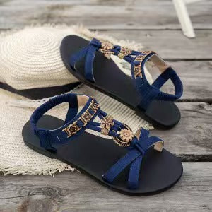 Bellwren — Round-Toe Flat Sandals with Floral Accent