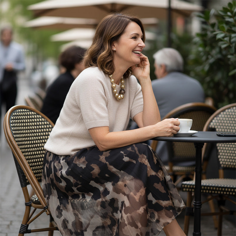 Two-Piece Women's Set Comprising a Sweater and a Flowing Skirt with Leopard Print