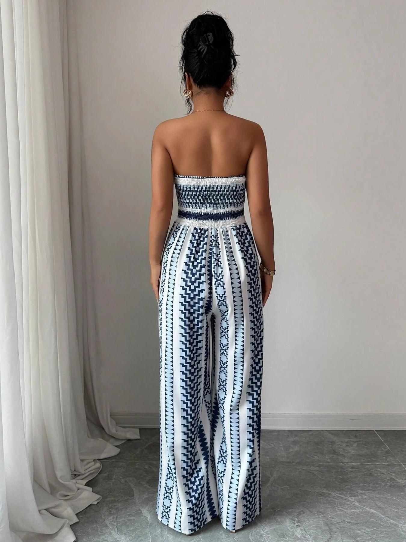 Vaelisse — Halter-Neck Geometric Print Jumpsuit with Side Slit