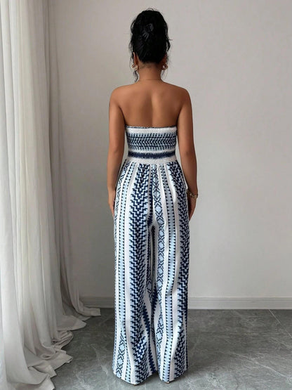 Vaelisse — Halter-Neck Geometric Print Jumpsuit with Side Slit